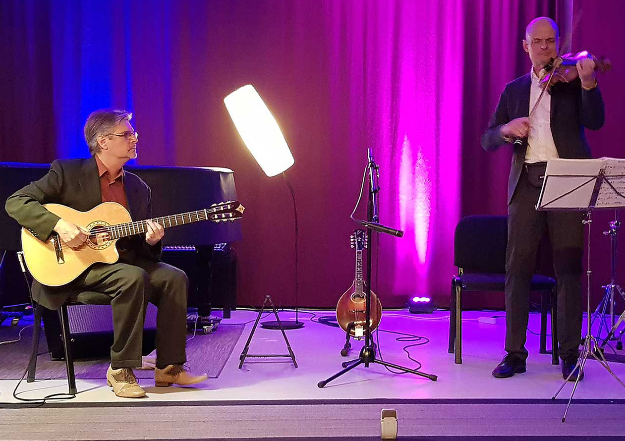 Rick Hannah plays acoustic jazz guitar on Alhambra with Ulli Bartel on violin and mandolin